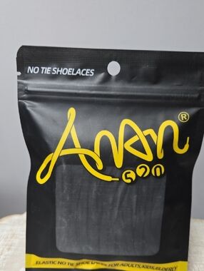 Amn No-Tie Shoelaces - Black and Yellow Packaging